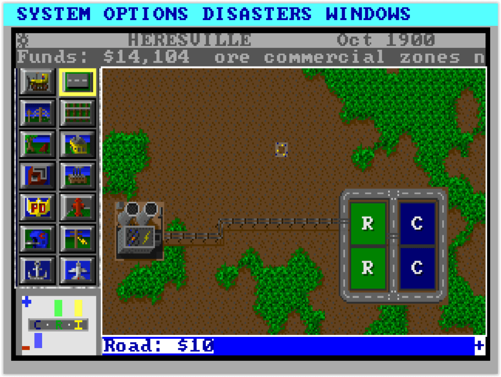 Début de ville dans SimCity sur DOS avec routes, zones résidentielles et centrale électrique